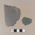 Slate, dark gray fragments; possibly roofing slate