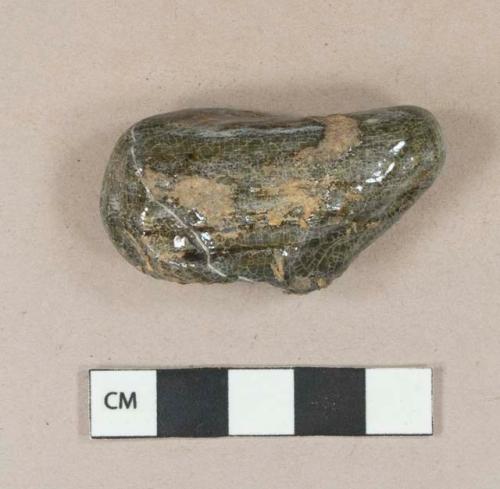 Dark green lead glazed rock or rock shaped ceramic