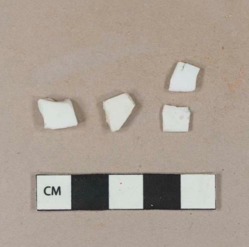 Undecorated porcelain body sherds; possibly hand painted overglaze porcelain body sherd