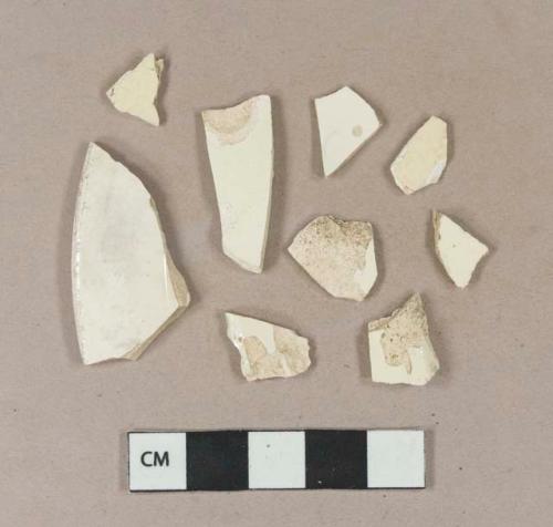 Undecorated creamware body sherds; undecorated creamware rim sherd