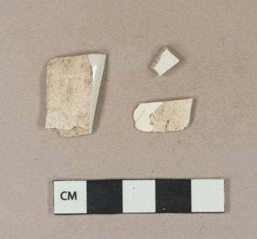 Undecorated pearlware body sherds; undecorated creamware body sherd