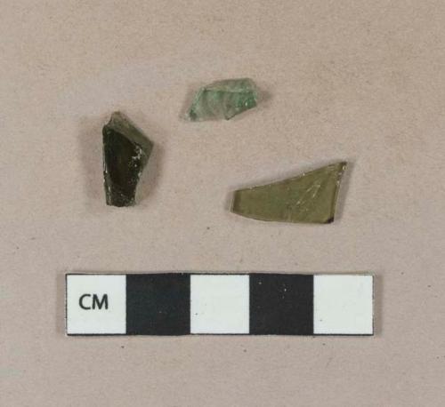 Olive green bottle glass fragments; aqua bottle glass fragment