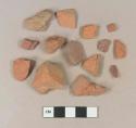 Brick fragments; slip decorated, lead glazed redware body sherd