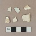 Undecorated creamware body sherds; undecorated pearlware body sherd