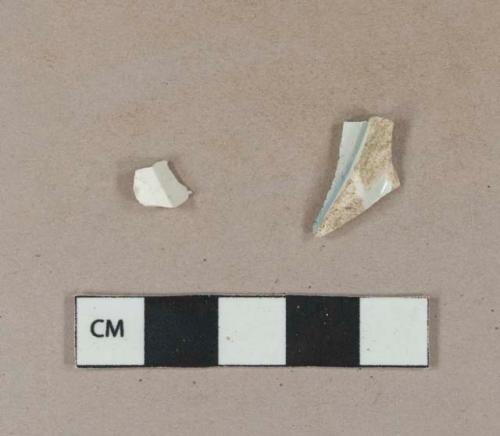 Undecorated whiteware body sherd; undecorated pearlware base sherd