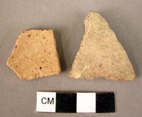 2 potsherds - cream slip, unburnished