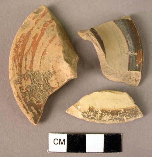 3 painted cyclix or goblet foot fragments