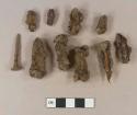 Unidentified iron nail fragments; iron wire nail; unidentified iron fragments; charcoal fragments