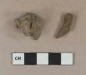 Unidentified iron nail fragment; slag fragment