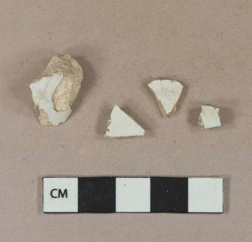 Undecorated whiteware body sherd; undecorated pearlware body sherds; green hand painted pearlware