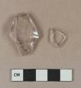 Colorless molded bottle glass fragment with slight manganese tint; colorless bottle glass fragment
