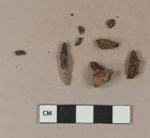 Iron nail fragments; unidentified iron fragments, likely originally from nail