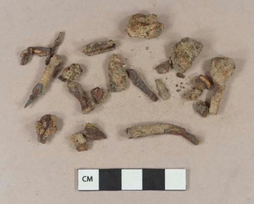 Cut or wrought iron nail fragments; unidentified iron fragments, likely originally part of nails