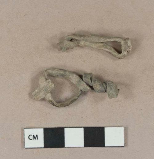 Unidentified lead strip fragments