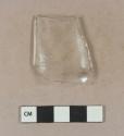 Molded colorless bottle glass fragment