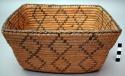 Rectangular basket, coiled. Geometric designs.