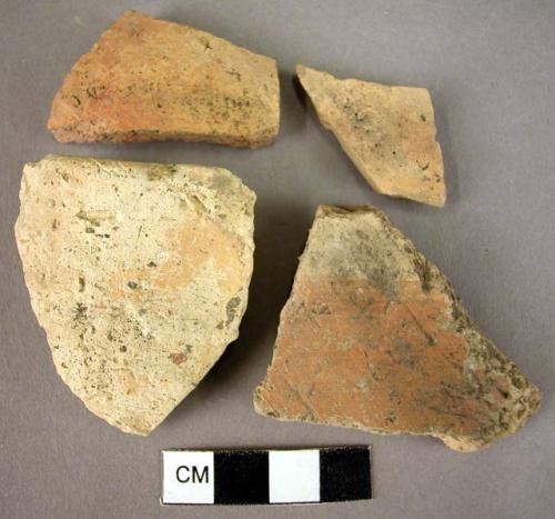 1 rim sherd, 3 potsherds, all urfirnis glaze ware, thin, partial streaky