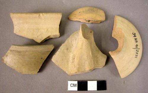 6 rim potsherds; 5  sherds; 1 sherd with handle fragment; 3 handle fragments; 1b