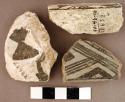 Ladle handle fragment, vessel fragment, and sherds