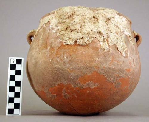 Jar, pottery, filled with cement-like substance