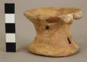 Small pot-stand.  Cream with red-line decoration.