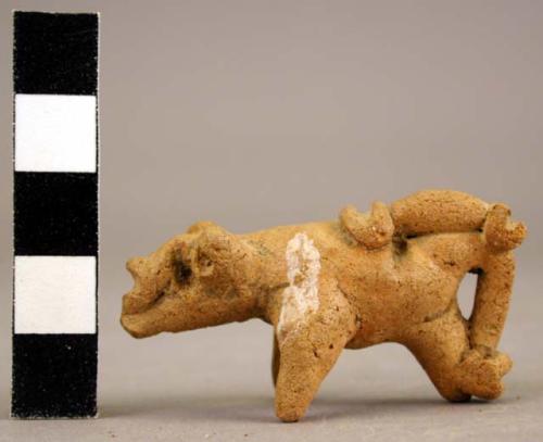 Miniature animal, no hole for suspension, traces of white paint ca. 5 1/2 cm