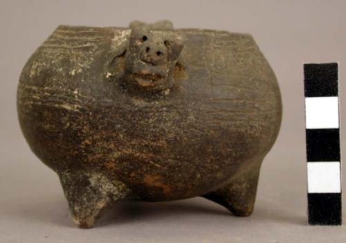 Tripod vessel, incised decoration