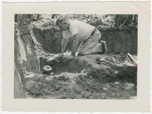 Samuel K. Lothrop excavating stone balls