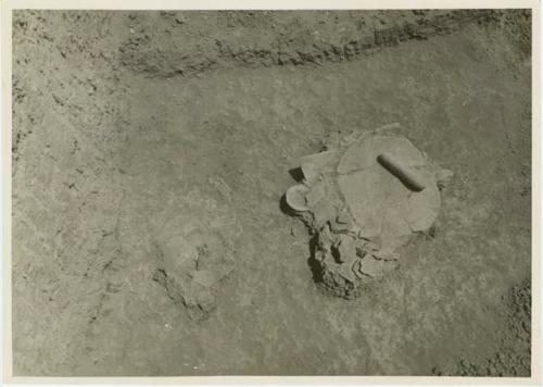 Trench III, Grave 3B, Cache 20 showing exposed pottery deposit