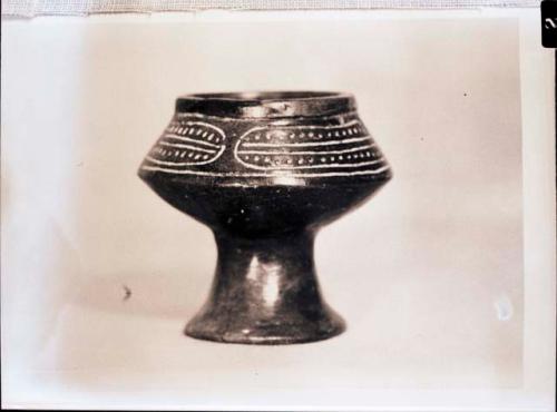 Ceramic bowl on pedestal