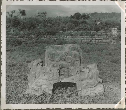 Large stone sculpture in an open field