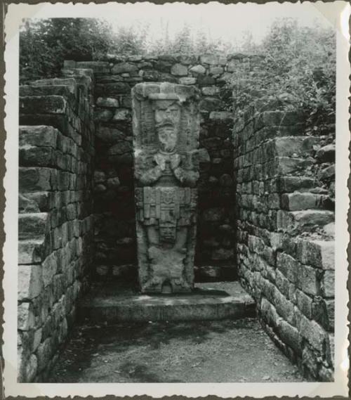 Stone wall with recessed stela