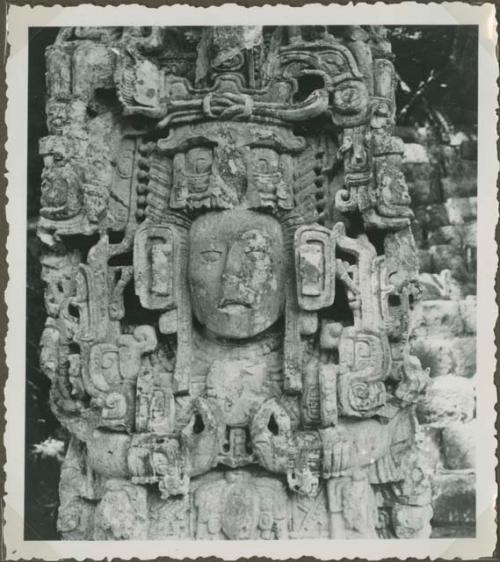 Closeup of head and torso area of stela