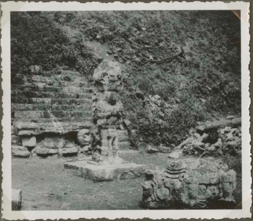 Stone stairway, upright stela, and stone sculpture