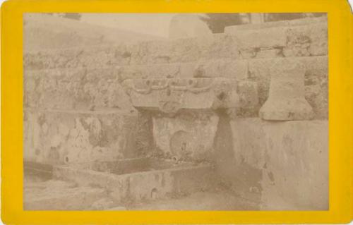 Carved stone steps and a watering trough