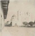 Church or large building and an open street