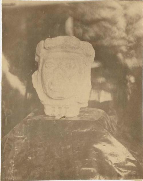 Carved stone head