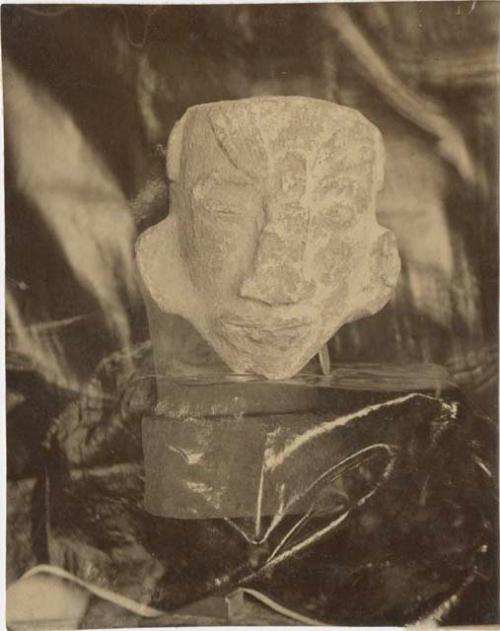 Carved stone head