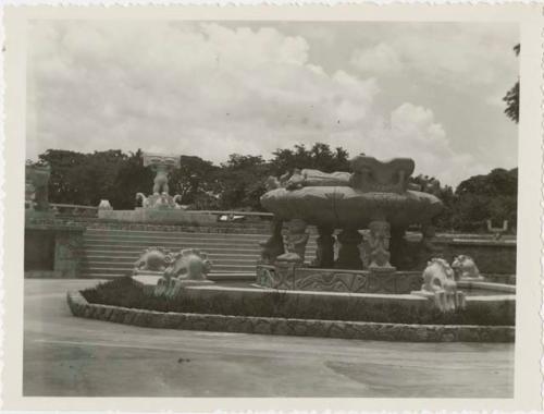 Carved fountain and statues in a public park or square