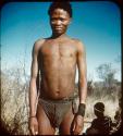 Slide from Marshall Expedition: "Bushmen, young man already betrothed to the girl"