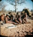 Slide from Marshall Expedition: "Bushmen boys making excellent animal figures from plastocene"