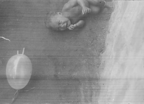 A young child, Padafan, cryng when a balloon is taken from him, part of a behavior sequence  of photos