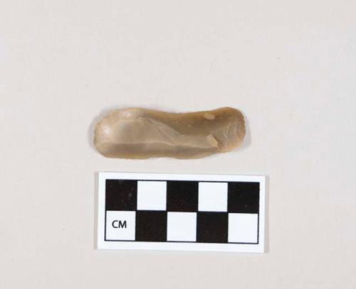 Flint flake; end-scraper made from retouched blade; tan-colored stone