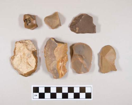 Flint flakes; mostly endscrapers; some with cortex; variously colored stone