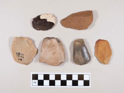 Flint flakes; mostly endscrapers; some with cortex; variously colored stone