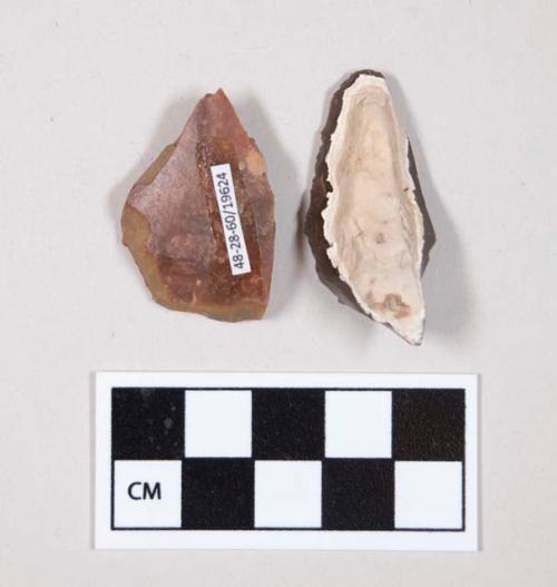 Flint scrapers, including brown, tan and rust colored stone, contain cortex