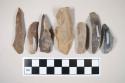 Chipped stone, flint blades, some with cortex, some with evidence of use, at least one polished at edge