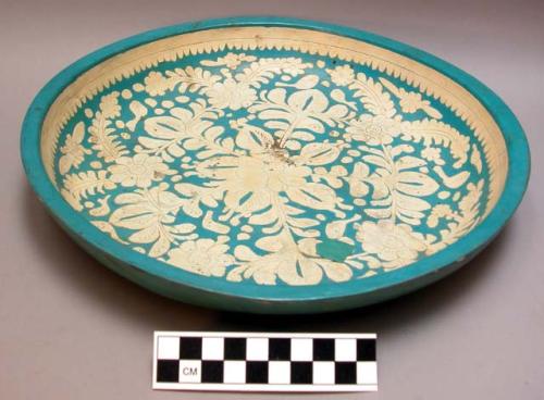 Decorated blue and white papier mache bowl