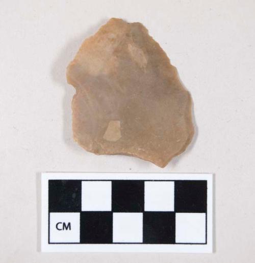 Chipped stone, flint flake, with possible retouching or use wear