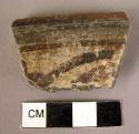 Sherds.  Inner surface decorated.  Exterior white slipped.